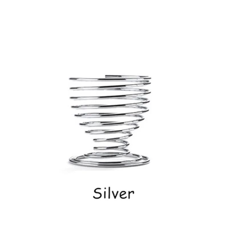 Silver spiral makeup sponge holder designed for organized storage and easy access