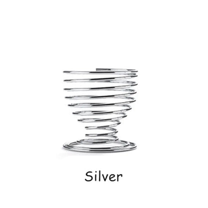 Silver spiral makeup sponge holder designed for organized storage and easy access