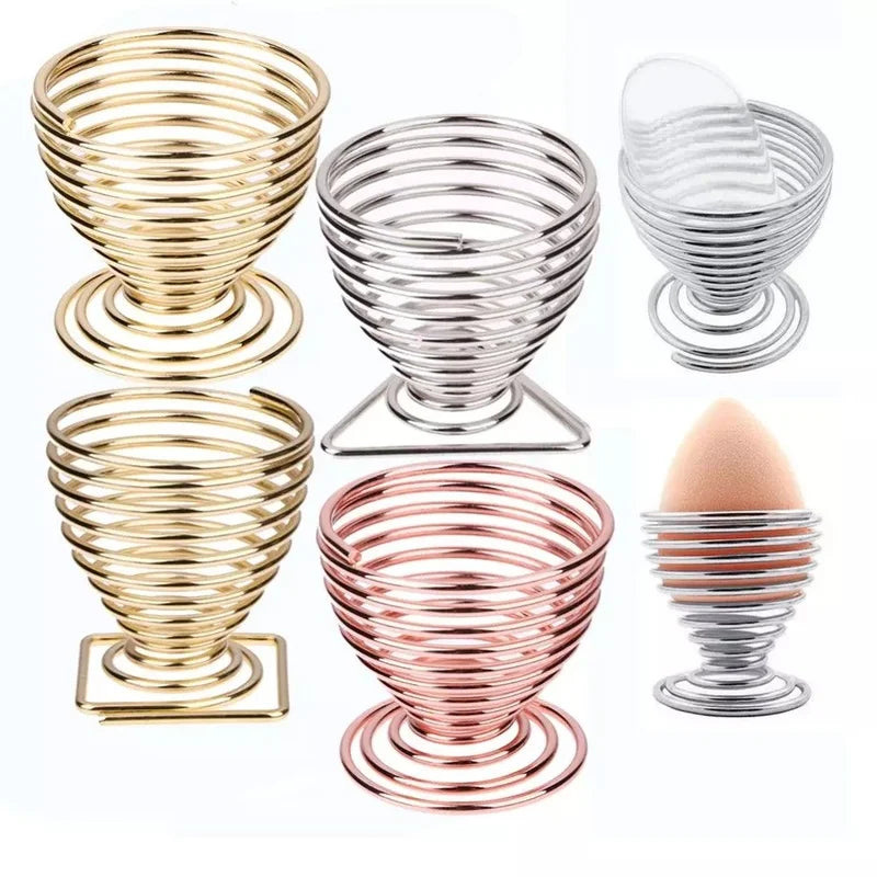 Set of stylish makeup sponge holders in gold, silver, and rose gold for organized beauty tools