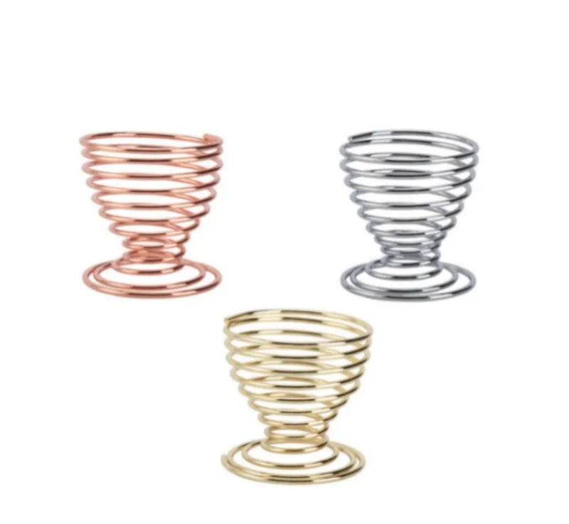 Set of three metal makeup sponge holders in rose gold, silver, and gold finishes for stylish organization