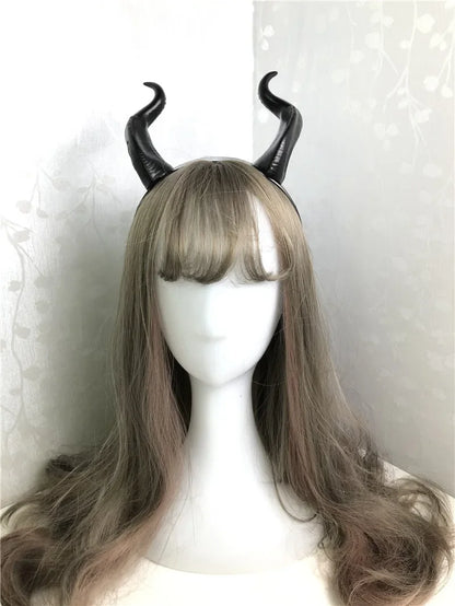 Maleficent witch horns costume headband featuring black twisted horns on a sleek headband