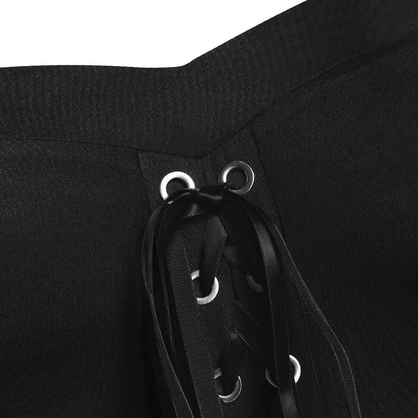 Detail of medieval Gothic witch costume showing lacing and eyelets in black fabric