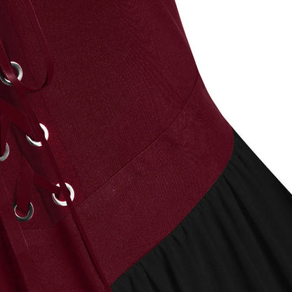 Close-up of the burgundy bodice detail on a medieval Gothic witch costume with lace-up design