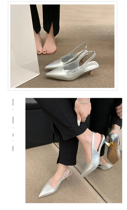 Silver mid heel pointed toe slingback shoes worn by a model with black pants