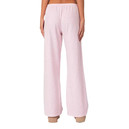 Back view of EtherealBe milk silk casual pants for women in soft pink, perfect for comfortable everyday wear
