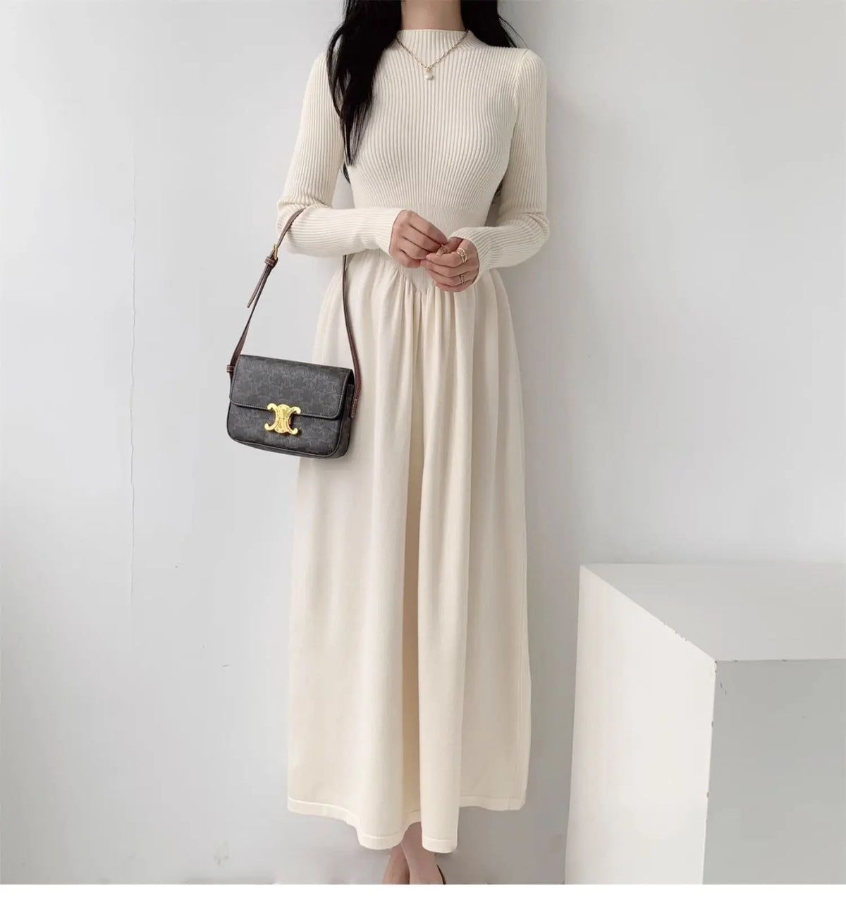 EtherealBe Long Sleeve Cream Dress with Ribbed Bodice and Flowing Skirt for Elegant Occasions