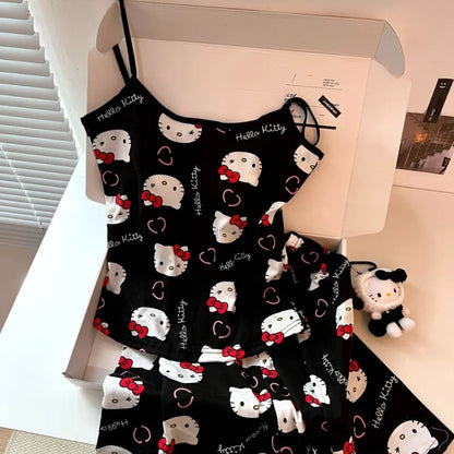 Hello Kitty pajama set for women black camisole and shorts with white Hello Kitty faces red bows hearts shown in gift box