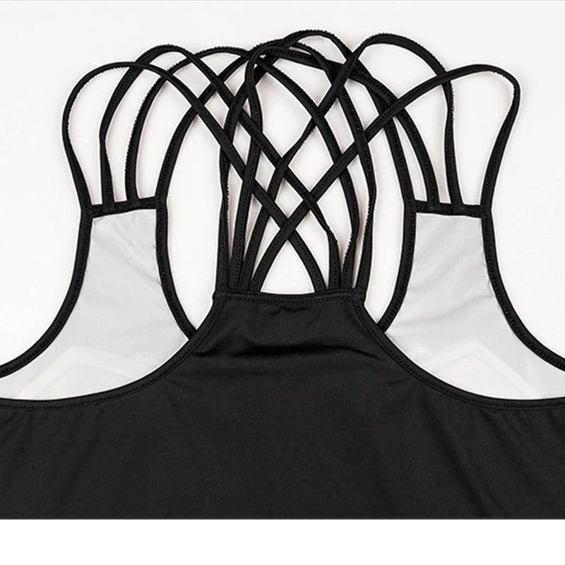 Black women superhero workout tank top with intricate crisscross thin straps and white lining back