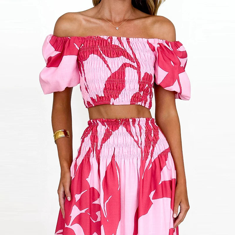 EtherealBe off shoulder floral skirt set featuring a smocked crop top and matching skirt in pink hues