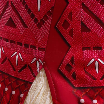 Disney Moana 2 Vaiana costume kids cosplay close up of red tribal patterned fabric with white tassel and bead details