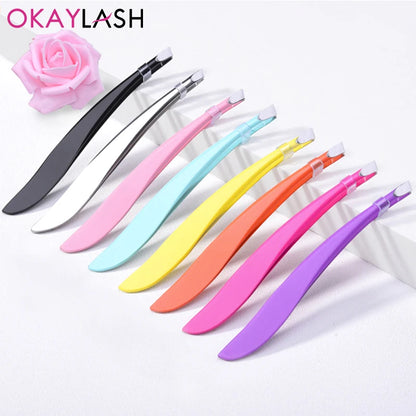 Colorful stainless steel lash clamps set in various shades for precise eyelash application