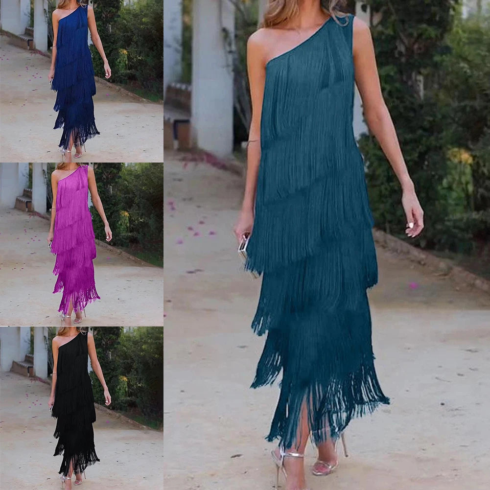 One shoulder layered tassel dress for women in teal, purple, and black in a stylish outdoor setting