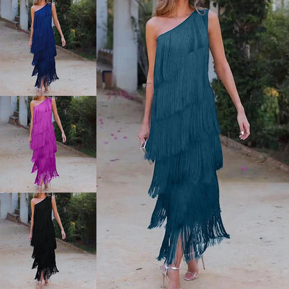 One shoulder layered tassel dress for women in teal, purple, and black in a stylish outdoor setting
