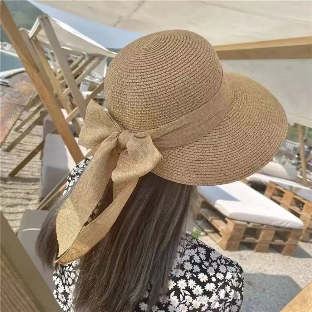EtherealBe Panama bowknot bucket sun hat with a wide brim and stylish back bow detail