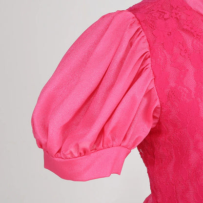 Close-up of a pink puff sleeve from a peach princess Halloween costume for kids