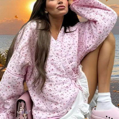 Stylish pink floral cotton jacket for women with comfortable fit, perfect for casual outings