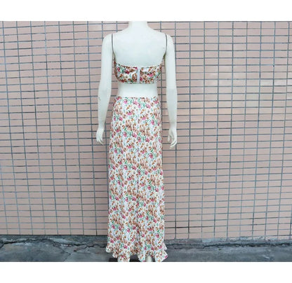 EtherealBe pleated ruffle edge dress set featuring a floral design with a chic cropped top and long skirt.