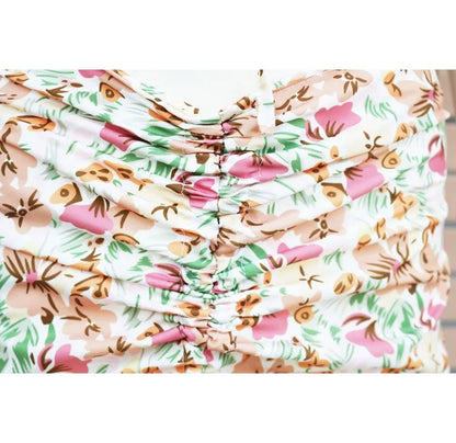 Close-up of EtherealBe pleated ruffle edge dress set featuring colorful floral design and ruched details