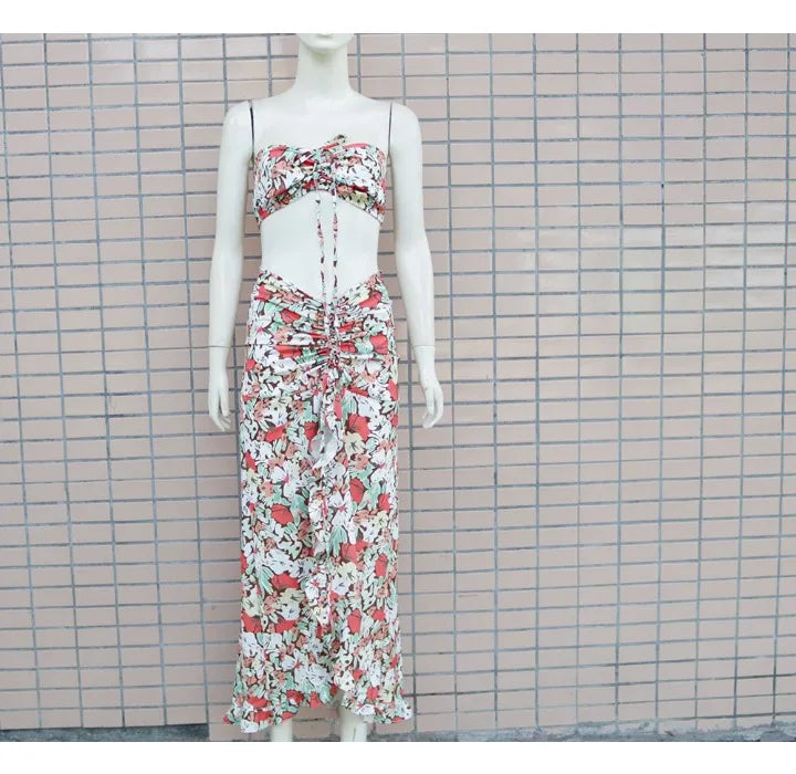 EtherealBe pleated ruffle edge dress set featuring a floral design and adjustable tie details