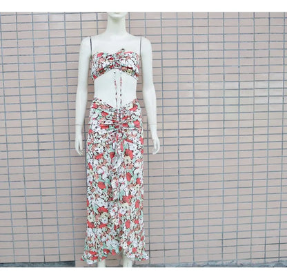 EtherealBe pleated ruffle edge dress set featuring a floral design and adjustable tie details