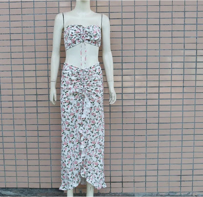 EtherealBe pleated ruffle edge dress set featuring a floral pattern and stylish crop top design