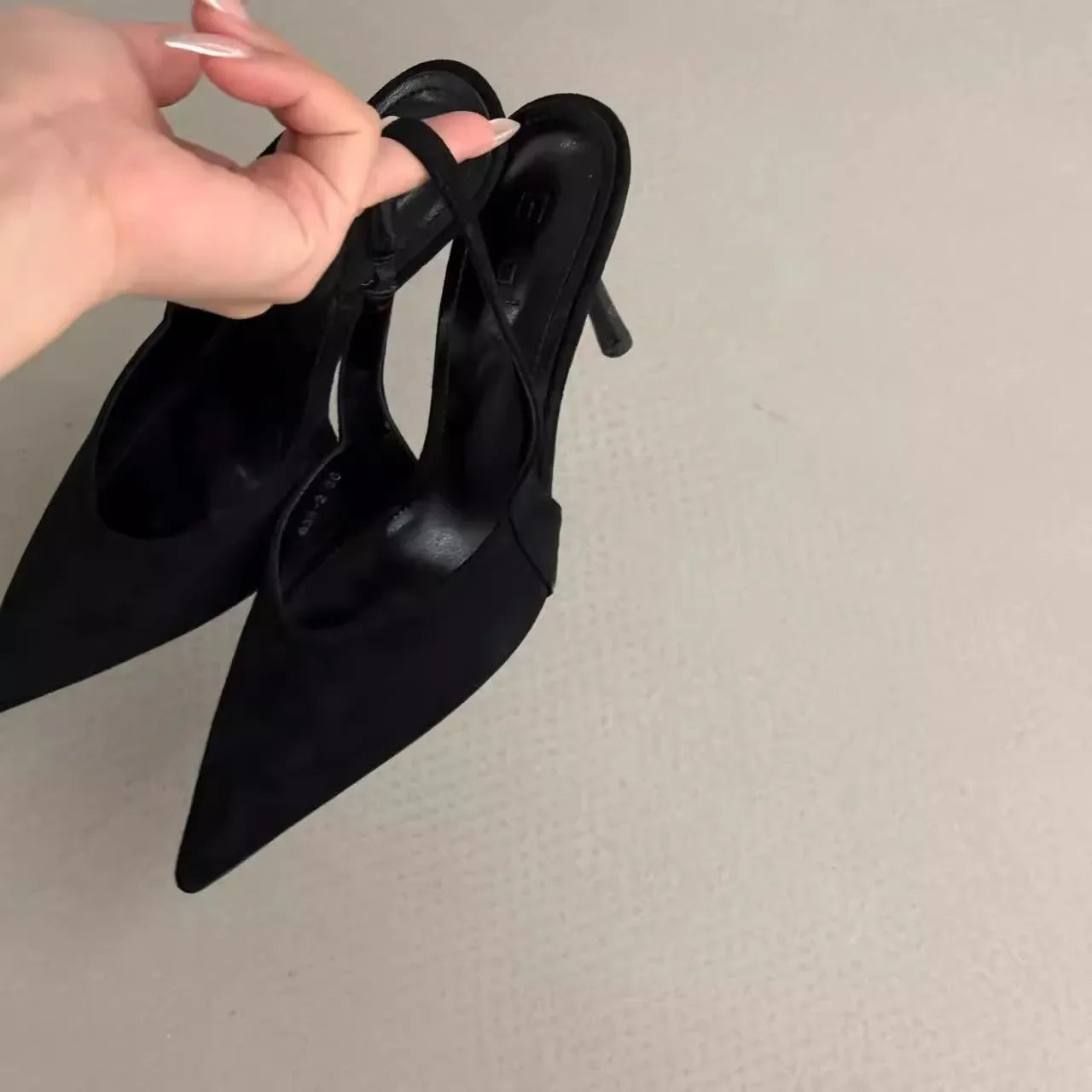 Black EtherealBe pointed toe slingback pumps for women with a chic design and stylish heel