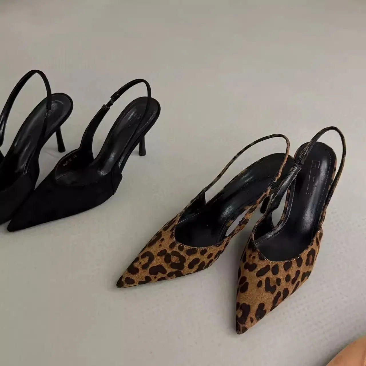 Black and leopard print pointed toe slingback pumps for women with stylish design