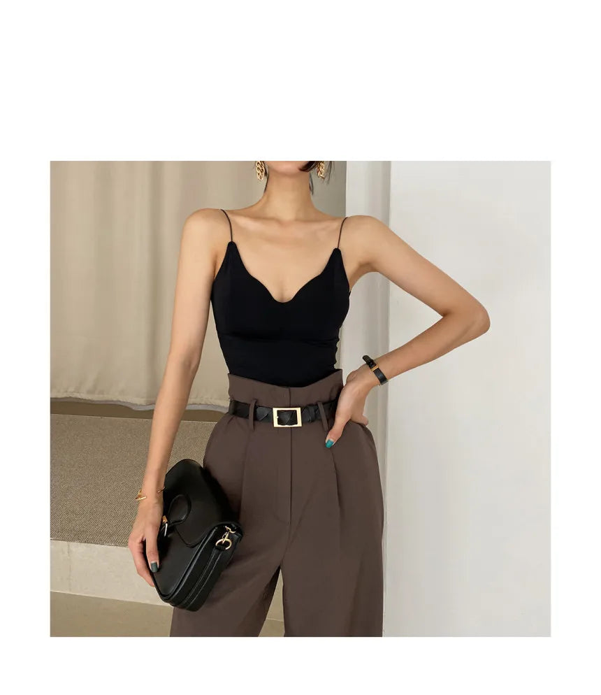 EtherealBe women's outfit featuring a chic black top and tailored brown trousers, perfect for professional corporate attire for women.