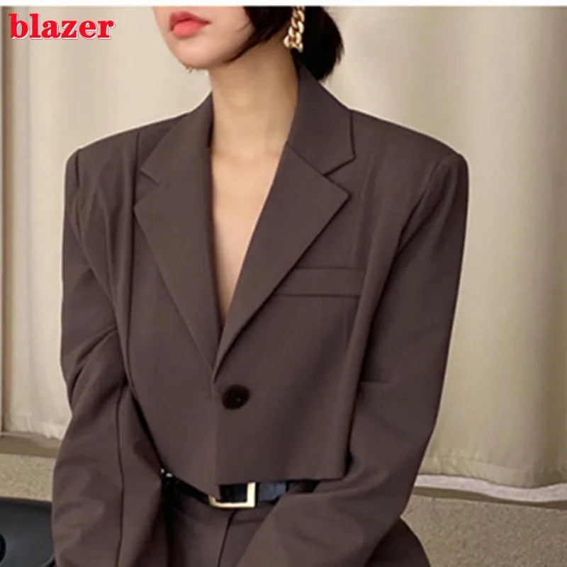 Elegant brown blazer showcasing professional corporate attire for women with a tailored fit.