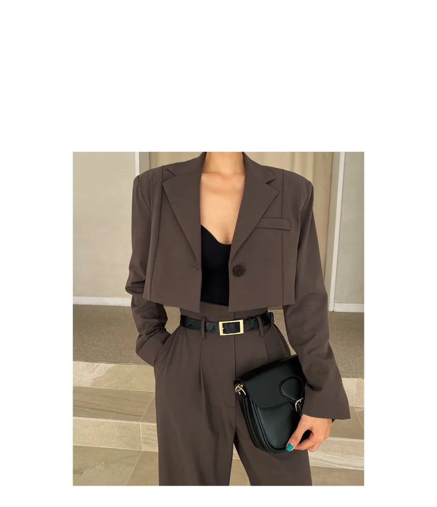 Stylish brown cropped blazer with matching high-waisted trousers, ideal for professional corporate attire for women