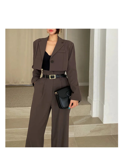 Chic brown cropped blazer and wide-leg pants styled as professional corporate attire for women