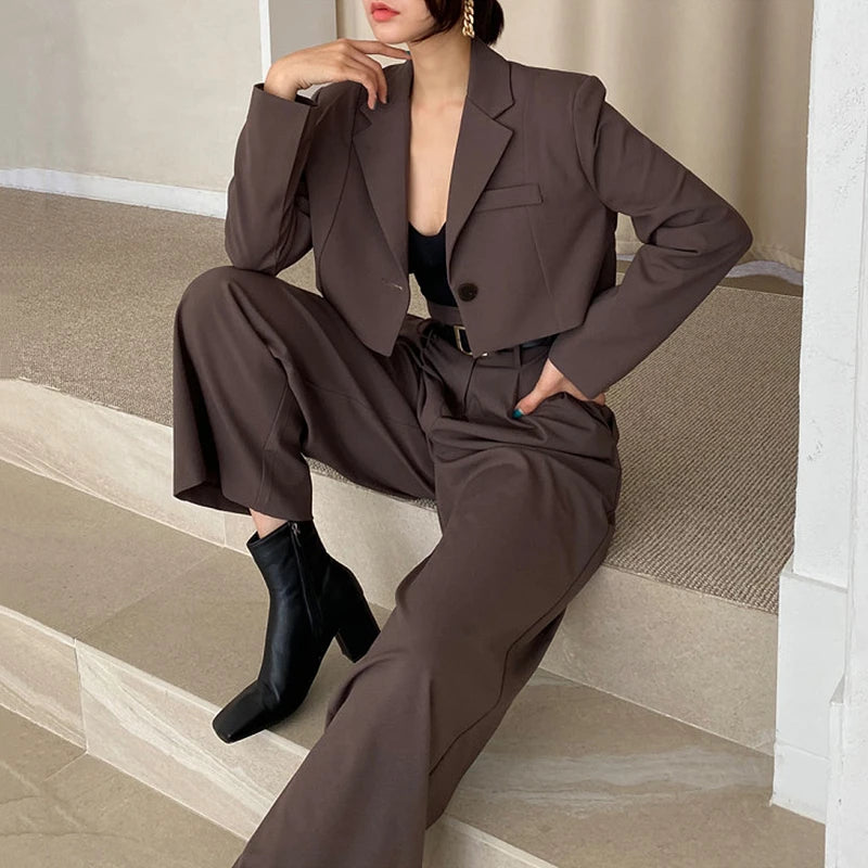 Stylish brown blazer and wide-leg trousers outfit, ideal professional corporate attire for women