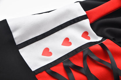 Close-up of the Queen of Hearts costume for women featuring heart details and elegant design