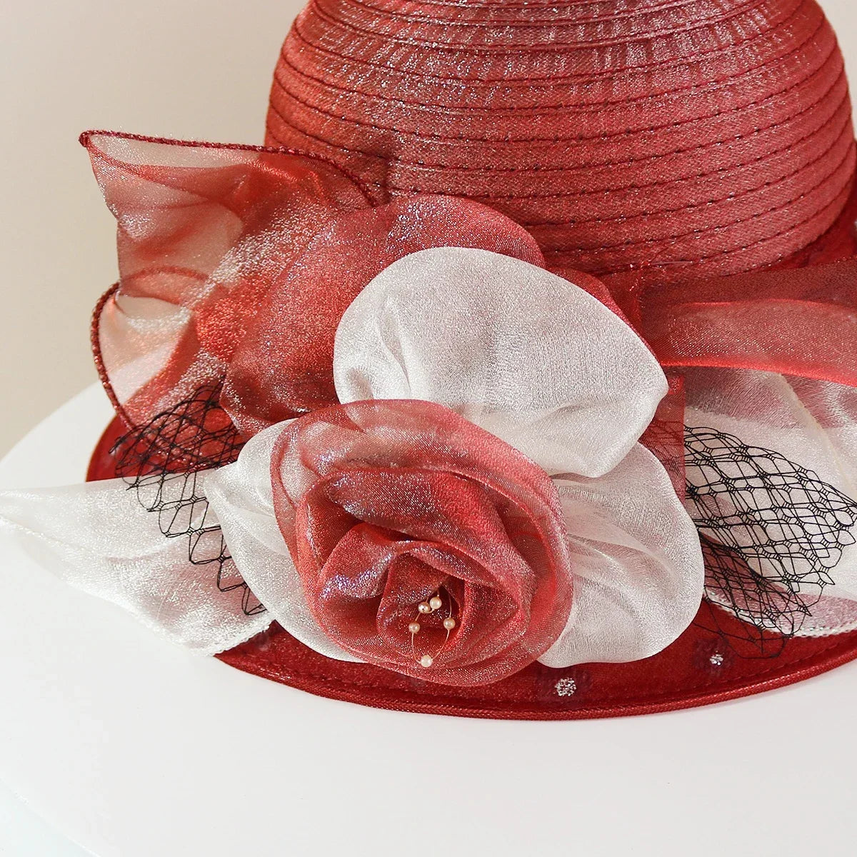 EtherealBe retro wide brim floral hat featuring elegant mesh and decorative flowers