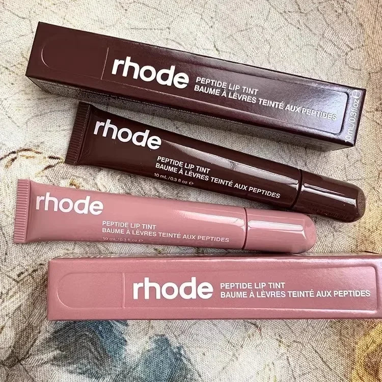 EtherealBe Rhode peptide lip tint tubes and boxes in mauve and brown Flavored moisturizing lip balm for dry lips