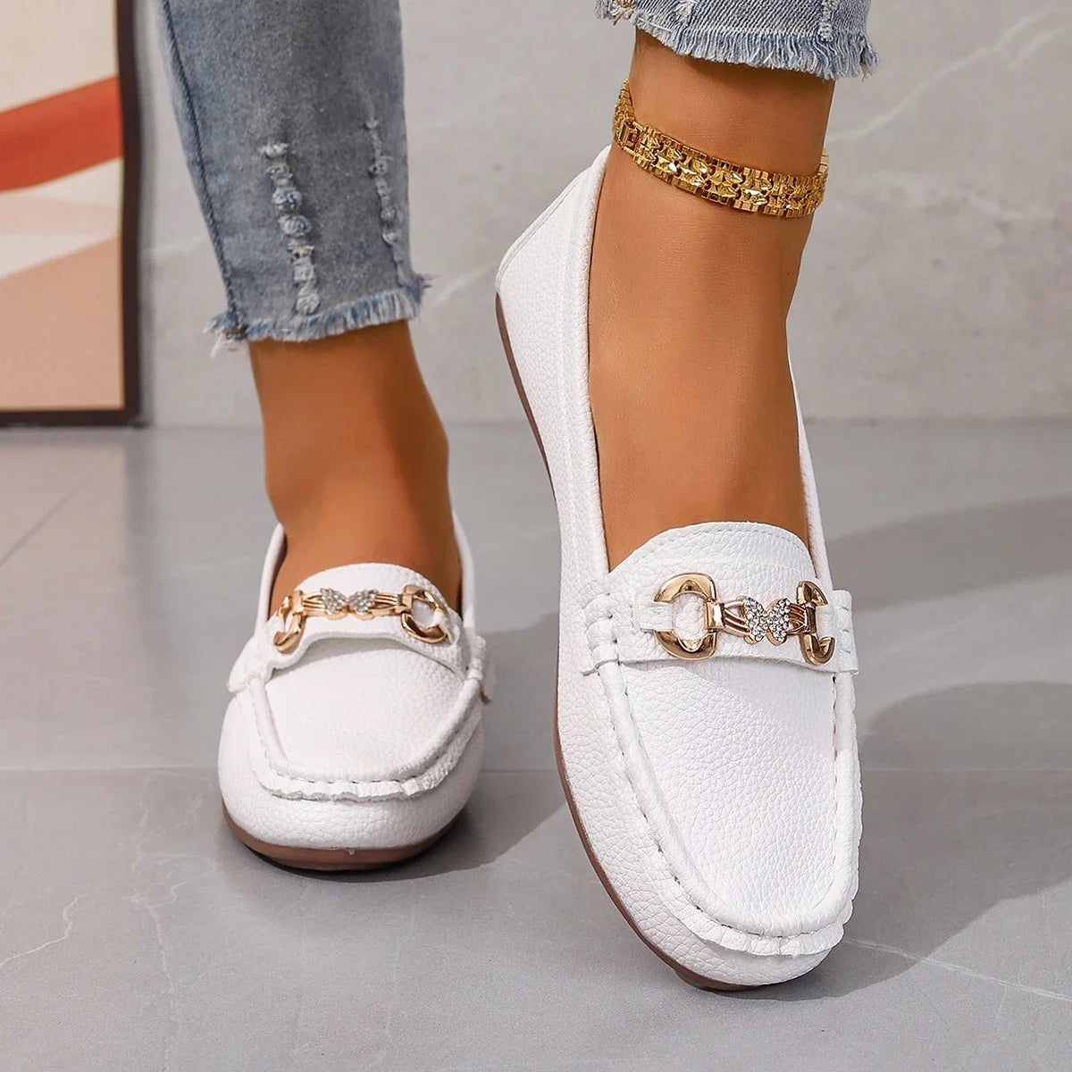 Stylish white women's slip on Mary Jane shoes with decorative chain accents for comfortable wear