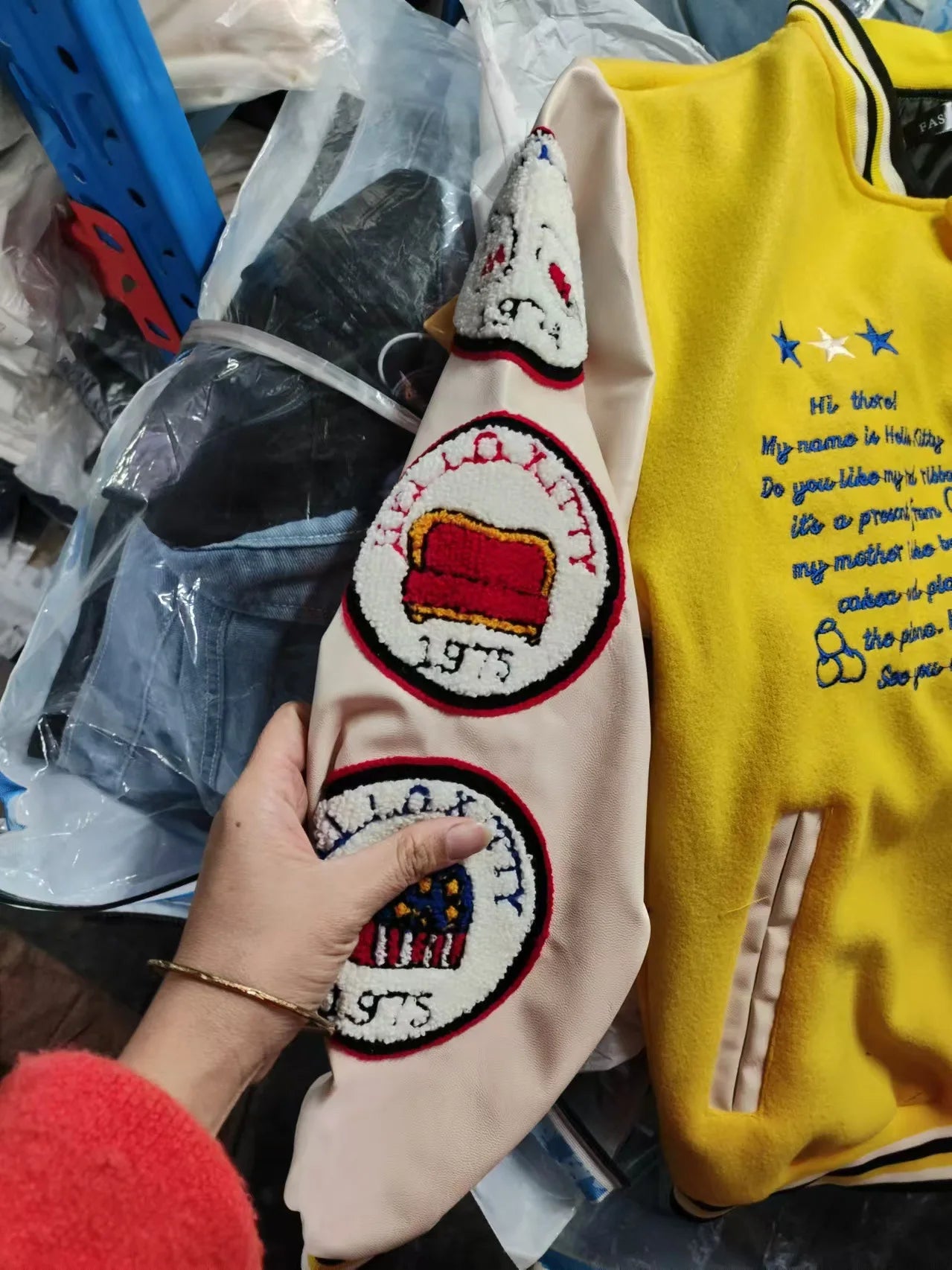 Hello Kitty baseball jacket yellow varsity style with cream sleeves embroidered patches 1975