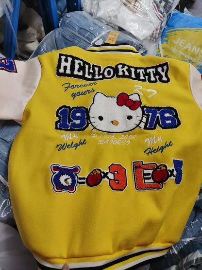 Hello Kitty baseball jacket yellow varsity style back view with embroidered Hello Kitty 1976 patch