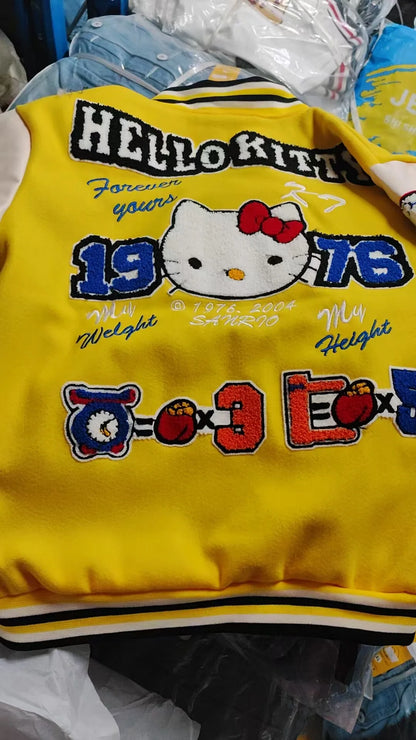 EtherealBe yellow Hello Kitty baseball jacket back view with embroidered Hello Kitty face and 1978 patches