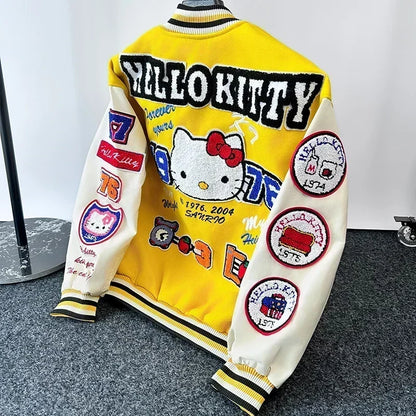 Yellow and white varsity Hello Kitty baseball jacket with large embroidered Hello Kitty on back and multiple colorful patches