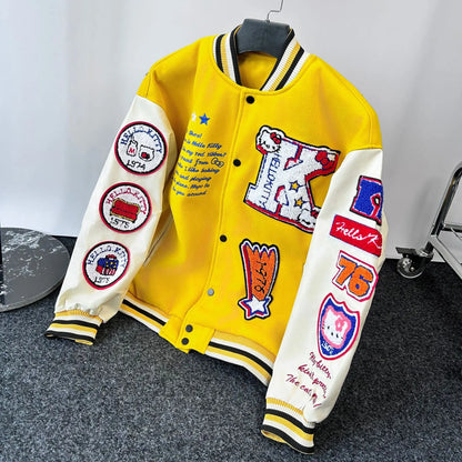 EtherealBe yellow varsity style Hello Kitty baseball jacket with white sleeves and embroidered patches