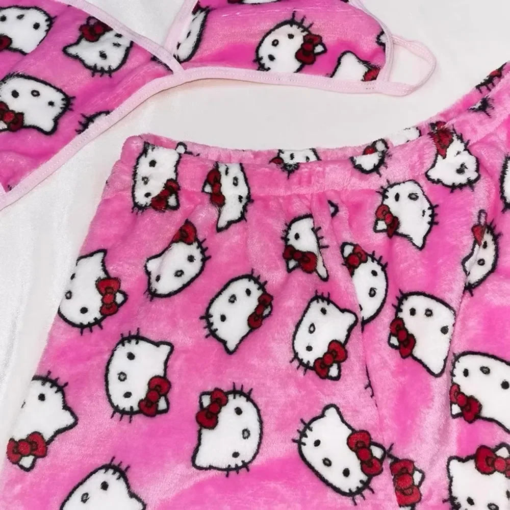 Ladies Hello Kitty bra and shorts sleepwear pink plush set with repeated Hello Kitty faces and red bows