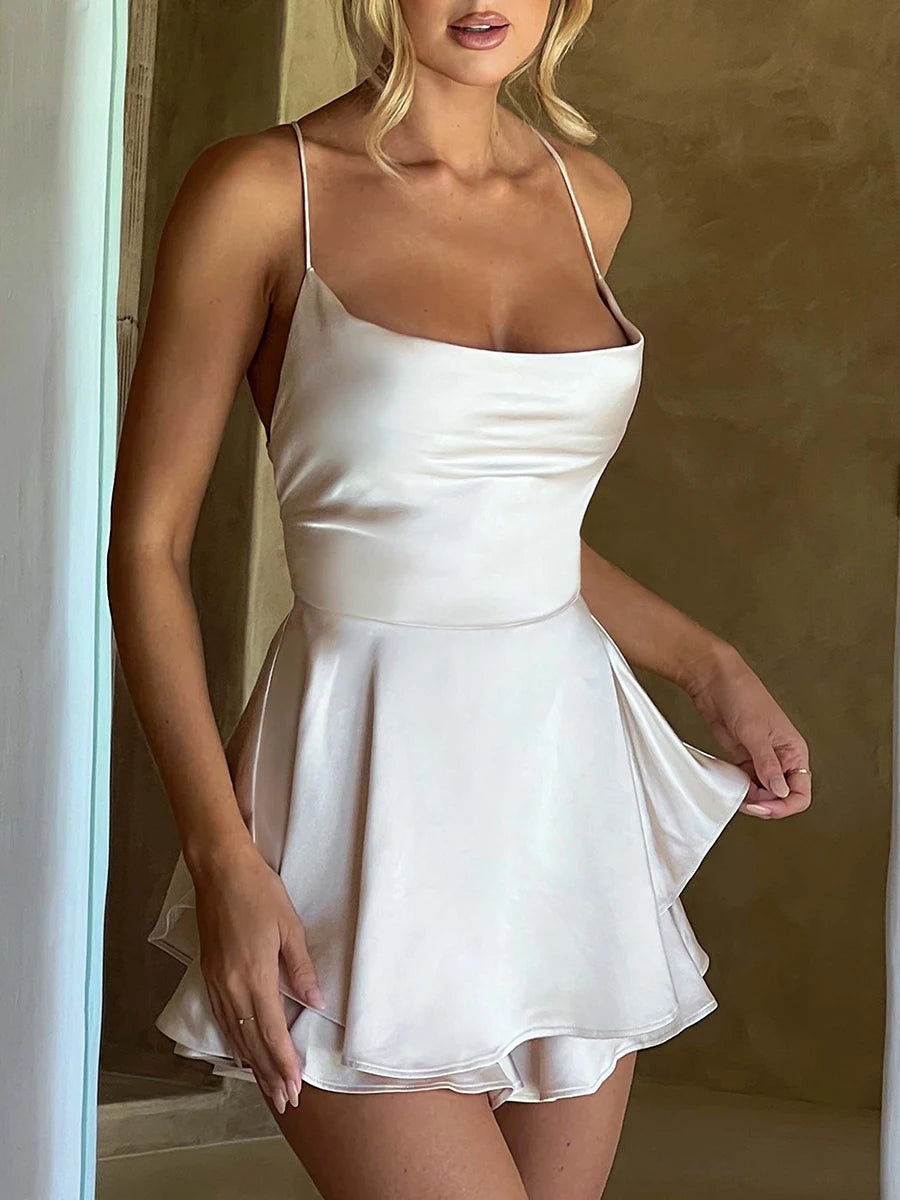 EtherealBe satin silk backless cami romper with a flattering fit and flowy skirt detail