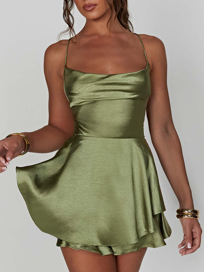 EtherealBe satin silk backless cami romper in olive green with a flared skirt design