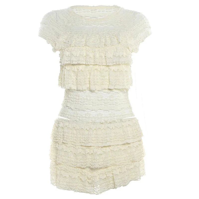 EtherealBe see through tassel skirt set in cream color with layered ruffle design for a stylish look