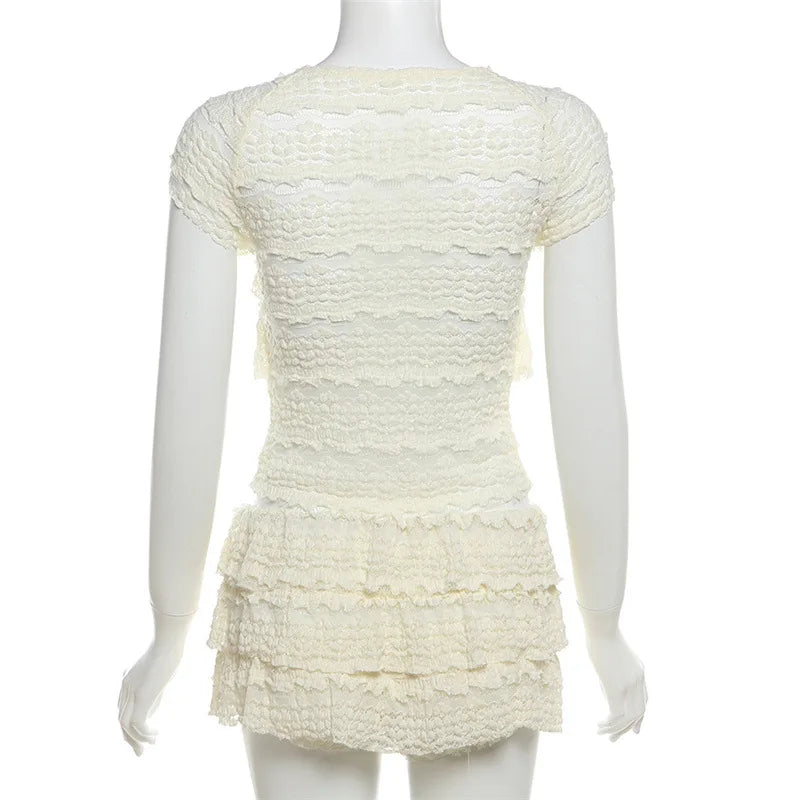 EtherealBe see through tassel skirt set with layered design and textured fabric for a stylish look