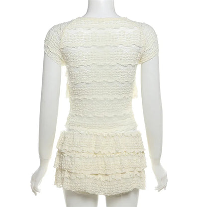 EtherealBe see through tassel skirt set with layered design and textured fabric for a stylish look
