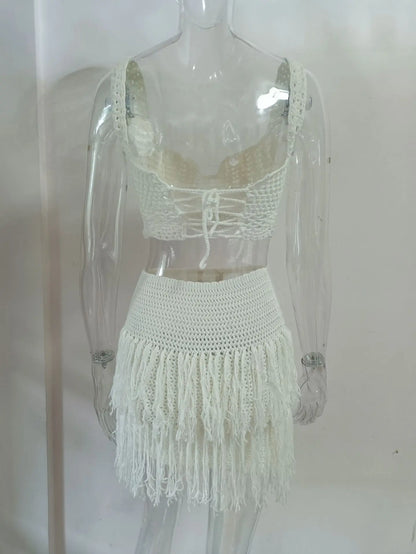 EtherealBe see through tassel skirt set featuring a crochet top and fringed skirt