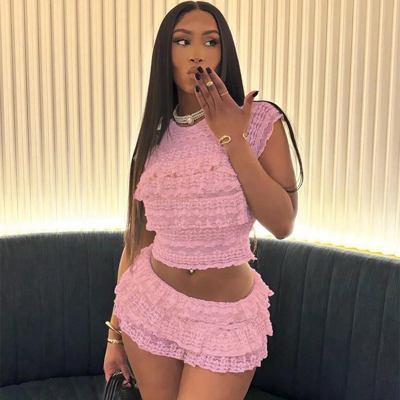 EtherealBe see through tassel skirt set in soft pink with a lace design and trendy silhouette