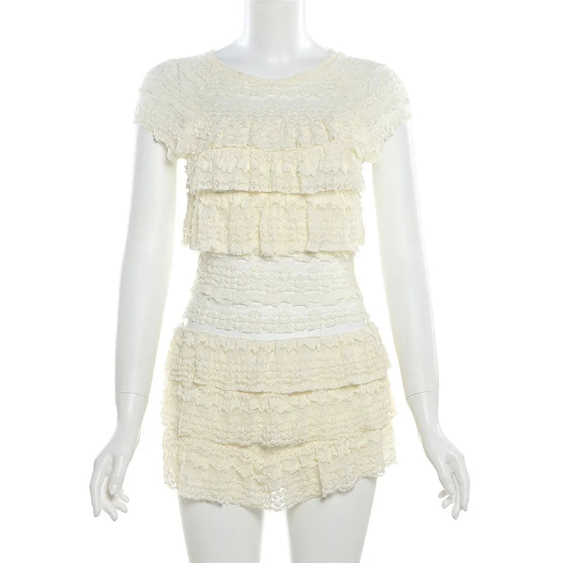 EtherealBe see through tassel skirt set in cream with layered ruffles and fitted design